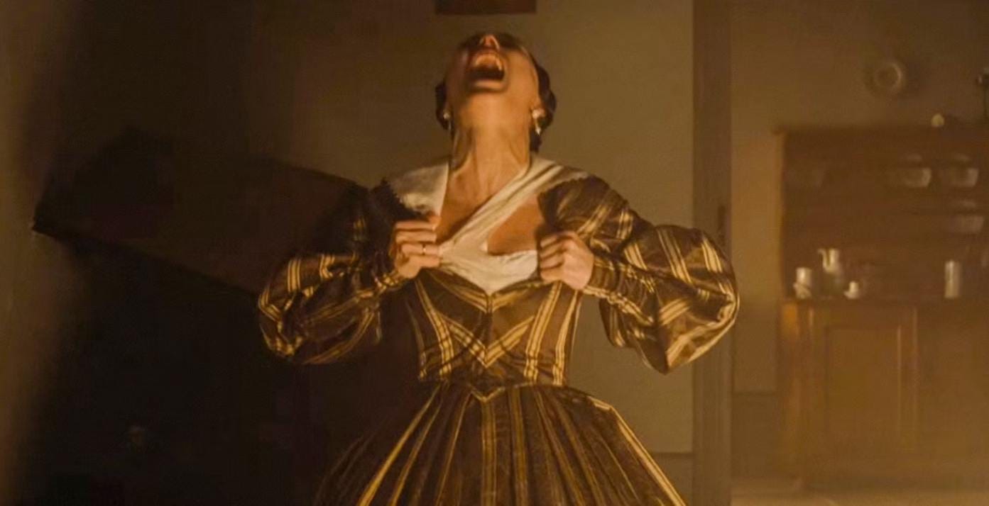A shot of Lily-Rose Depp in Nosferatu screaming and tearing open her dress and just kind of going psycho