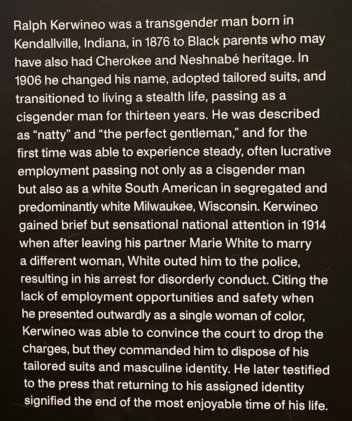 A museum placard telling the story of Ralph Kerwineo, a black trans man who lived for 13 years as a man in Milwaukee until he was outed by his ex-wife