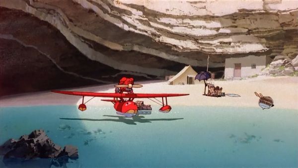 Still from Porco Rosso showing plane in beach cove