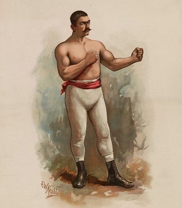Illustration of an old-timey boxer in white leggings, with a red sash and black boots. He stands with his fists raised. His moustache is impressive.