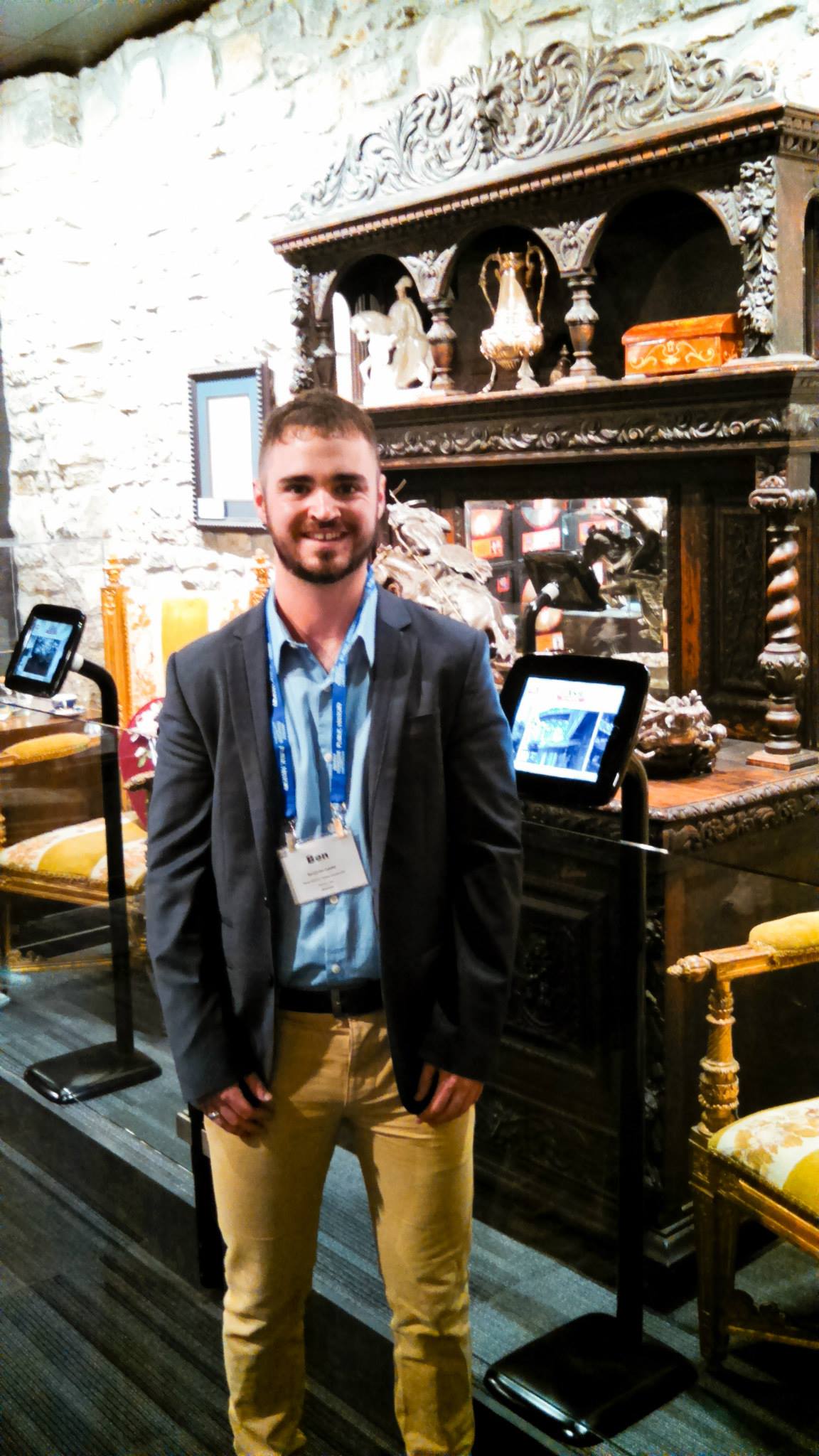 A graduate student stands in front of an exhibit at the Johnny Cash Museum in Nashville, Tennessee