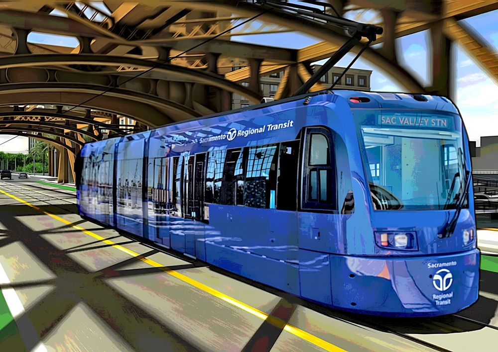 A rendering shows a SacRT streetcar traveling across the Tower Bridge as part of the proposed Downtown Riverfront Streetcar project. Image: SacRT.