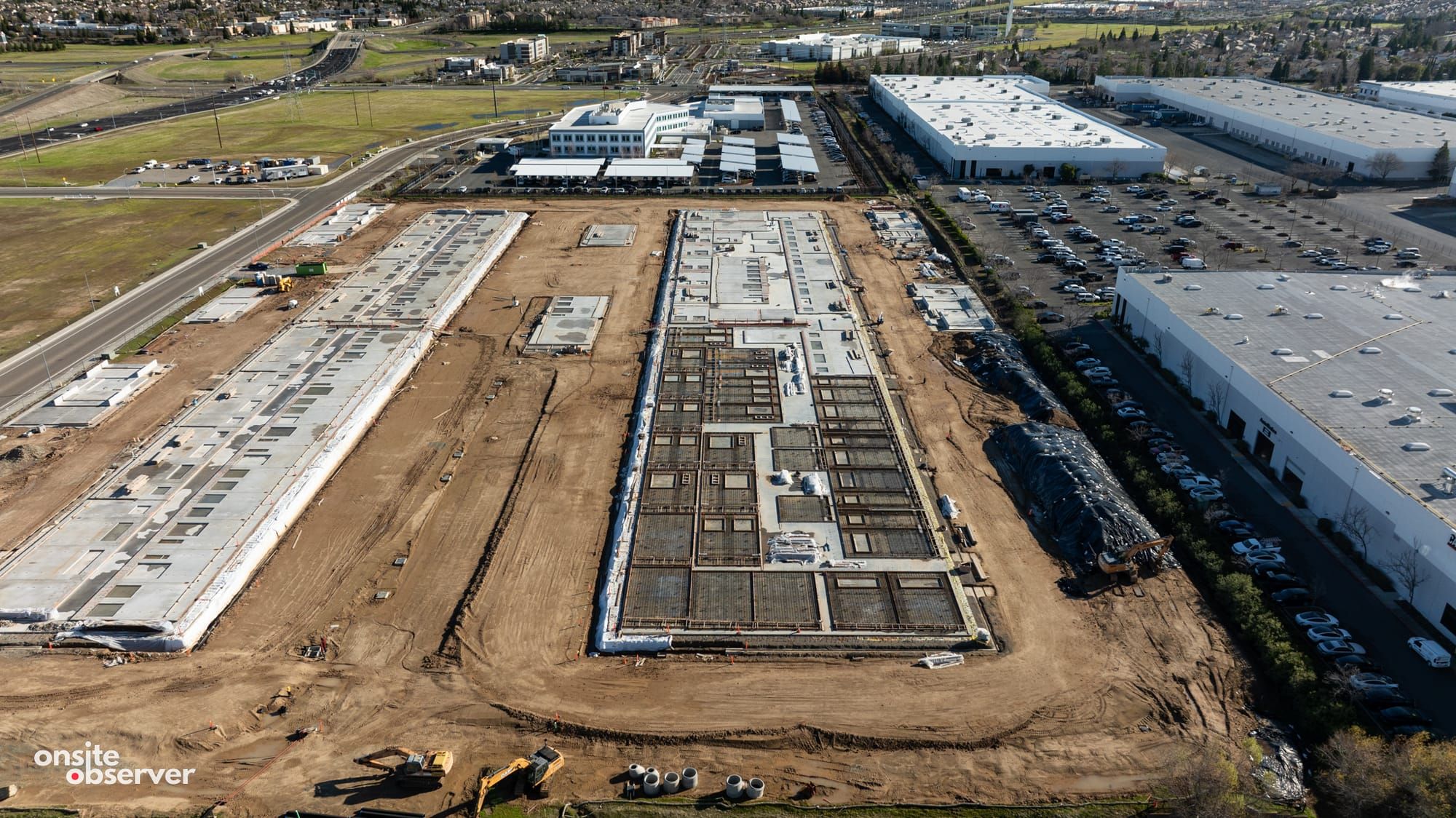 An aerial image capturing the construction progress of the first two buildings, part of the Blue Oaks Commerce Center. 