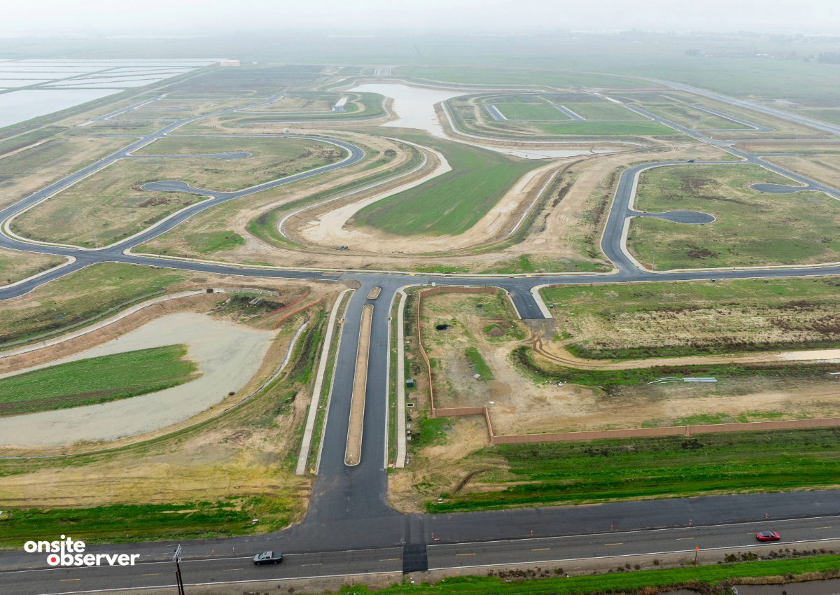 Freshly paved roads and stormwater basins cut through former farmland at Sutter Pointe, where a long-planned development is beginning to take shape in Sutter County.