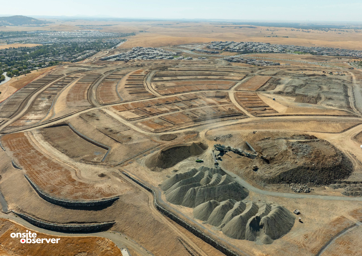 An aerial view shows grading and roadwork underway at Folsom Heights, where future home sites are being carved out