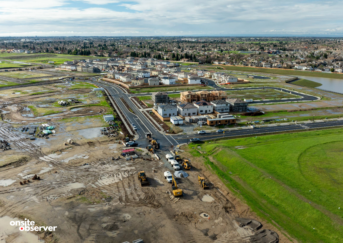 An aerial look at the Natomas Panhandle shows new homes rising, streets paved, and active construction. Image courtesy of Onsite Observer. 
