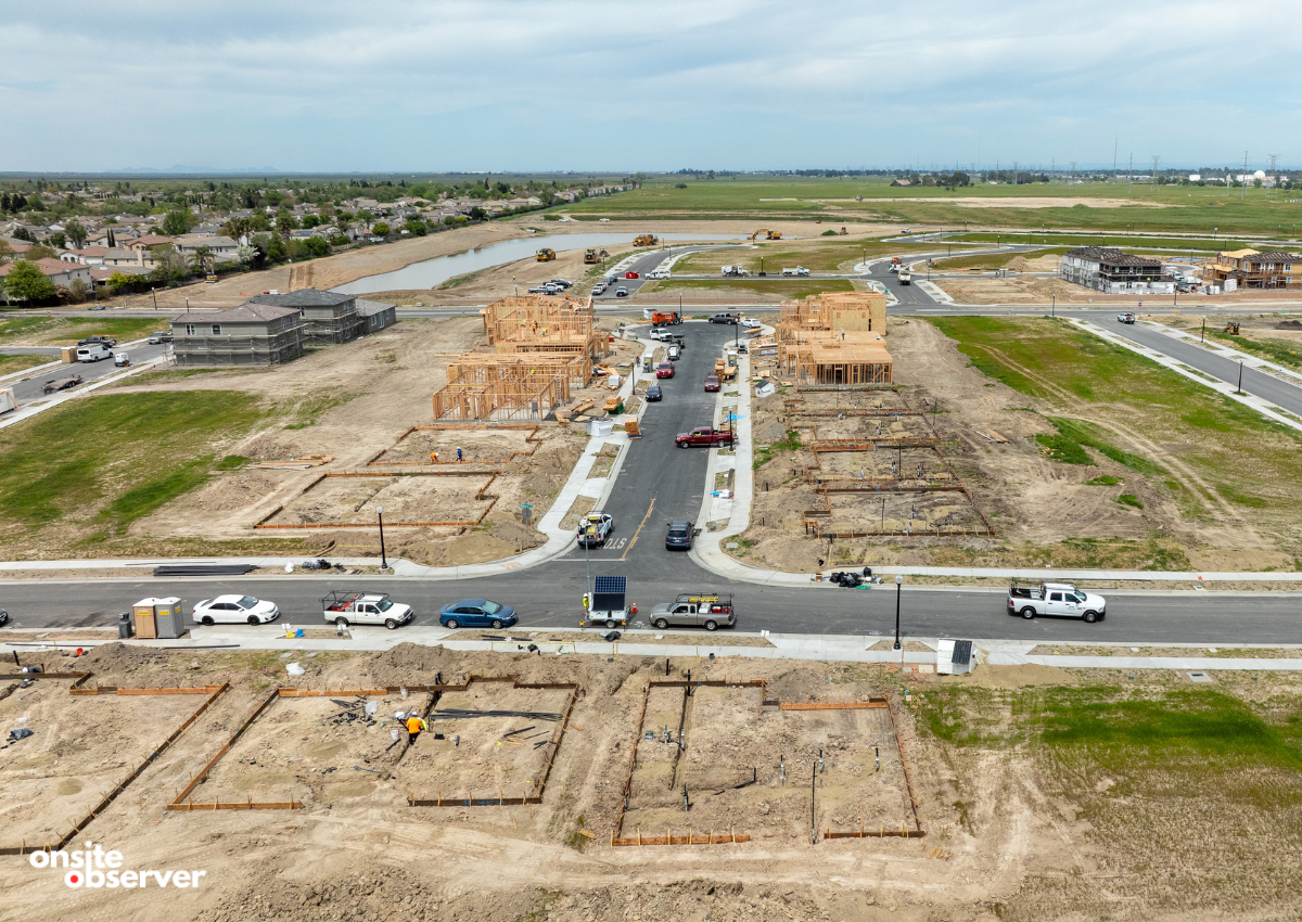 A drone view shows new homes rising on recently graded lots in a Sacramento-area subdivision. Image: Onsite Observer.