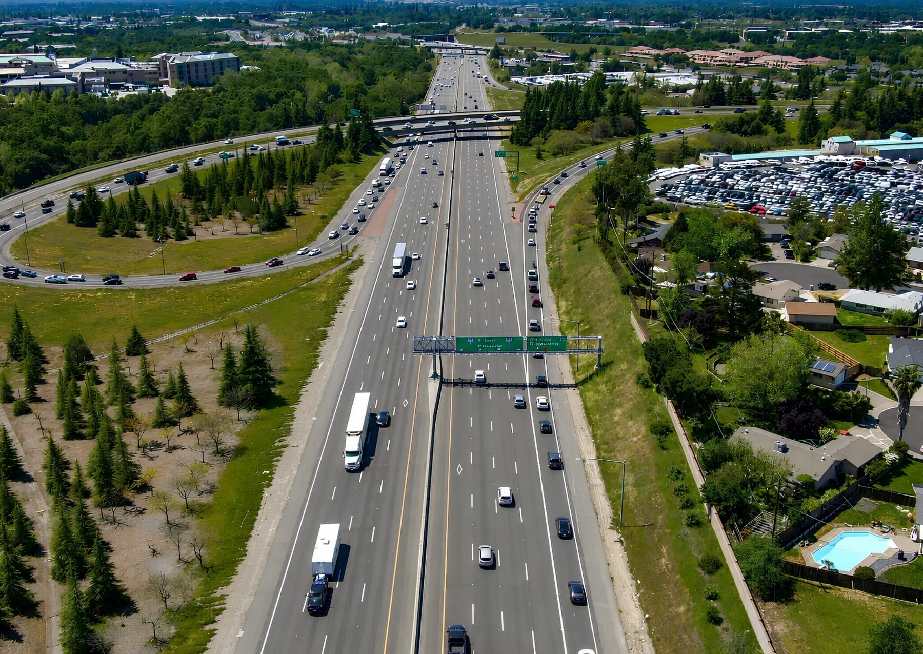 An aerial view shows traffic moving through the I-80/SR 65 interchange in South Placer County near Roseville and Rocklin. Image: Placer County. 