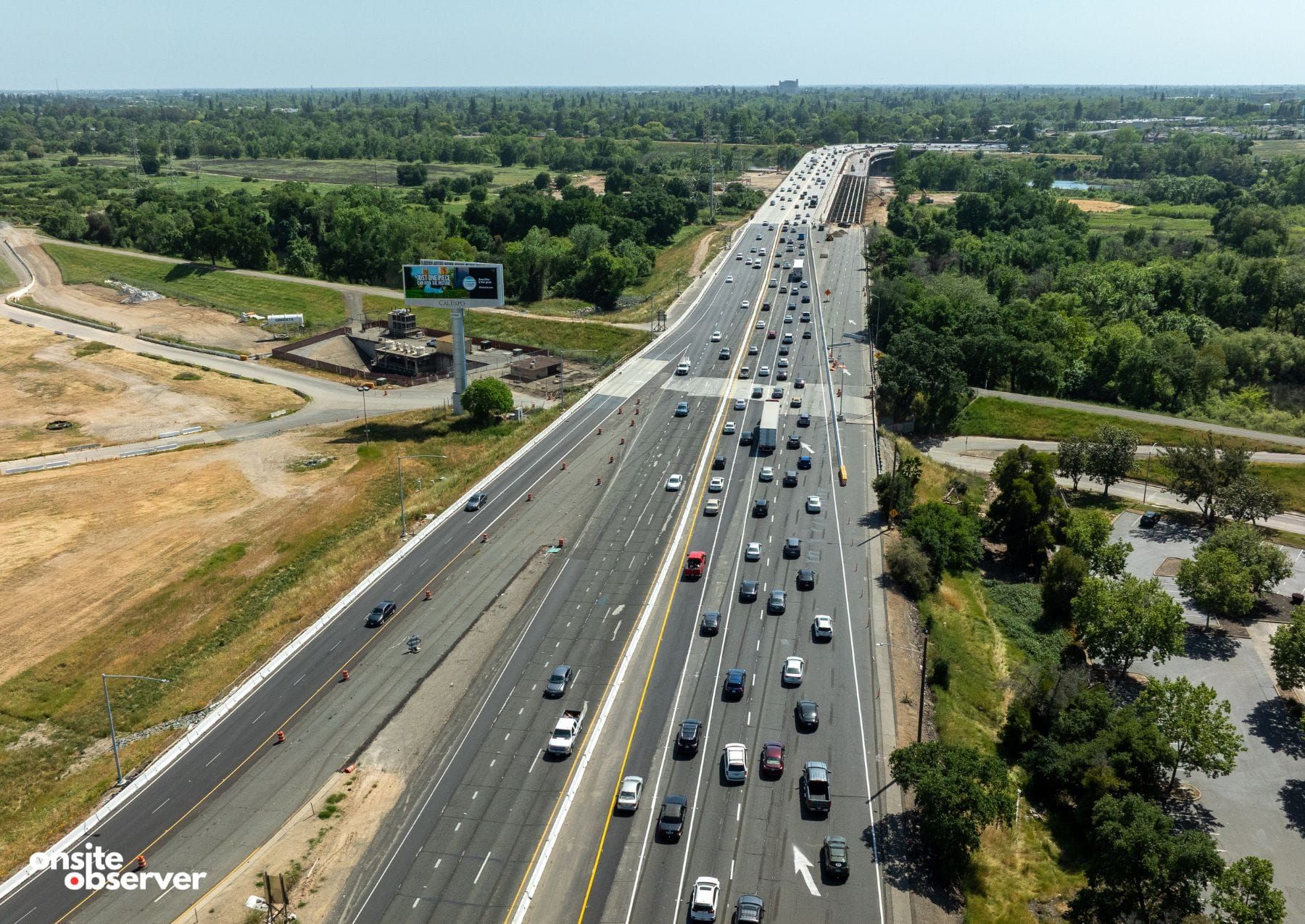 An aerial view of traffic moving through the American River Bridge Rehabilitation Project in Sacramento.