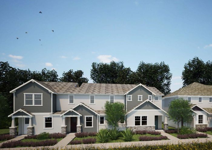 An architectural rendering shows townhomes and landscaped walkways proposed for Dorado Oaks, a 378-home development in Diamond Springs, El Dorado County. 