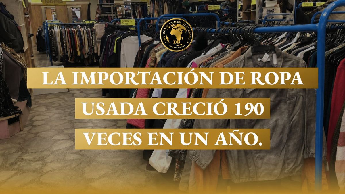 Percheros con ropa de segunda mano en tienda, reflejando el crecimiento de la importación de ropa usada y su expansión en el mercado argentino.