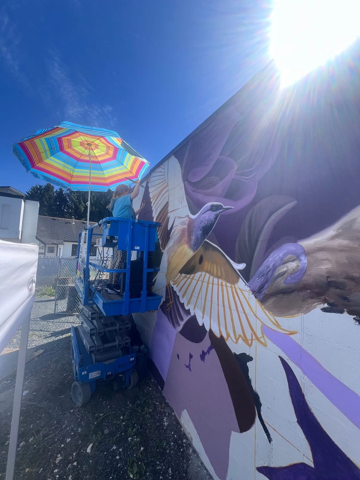 Dutch muralist Nina Valkoff blesses troubled Chilliwack corner with wild ethereal feline splendour