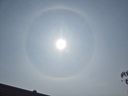 Regenbogen um die Sonne