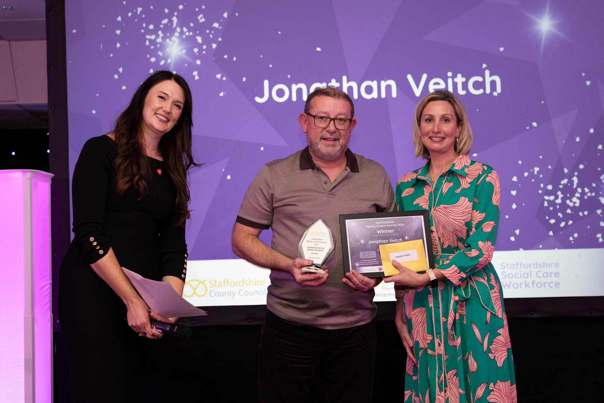 Jonathan Veitch receiving his Dignity in Care award