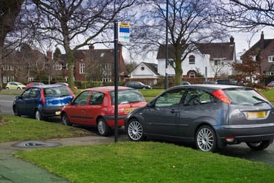 Parked cars blocking a bus stop near the Bowling Green island. Picture: Nick Brickett