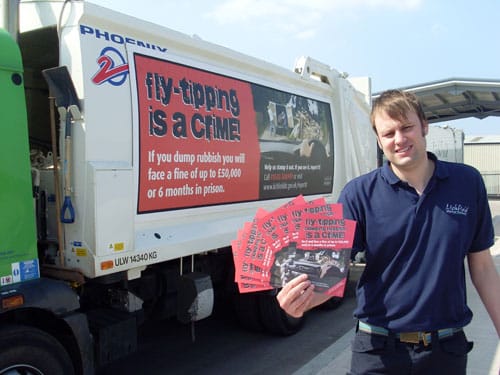 Glenn Ogden in front of the new mobile campaign