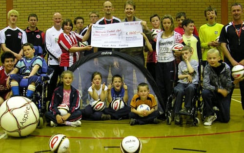 whittington-fc-disability-funding1 Matthew Ellis with Steve Kirk at a special needs coaching session