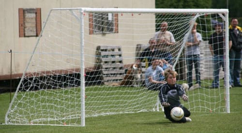 Elsie Baxter saves one of the penalties for Lichfield Diamonds