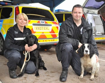 staffs-police-at-county-show-pic Two members of Staffordshire Police's sniffer dog team with their handlers