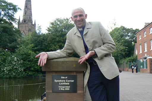 Canon Wilcox showing off the stylish plaque