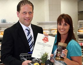 Gary Brooks, manager of Midlands Co-op’s Lichfield Superstore with Sonia Bennett