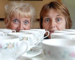 870 Lyn Shiel and Jayne Tooth get ready for St Giles Hospice’s first ever Mammoth Coffee Morning Week