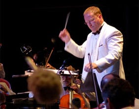 Adrian Jackson conducting the City Concert Orchestra