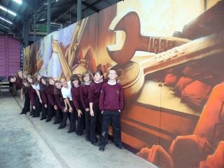 Year 9 students with their mural