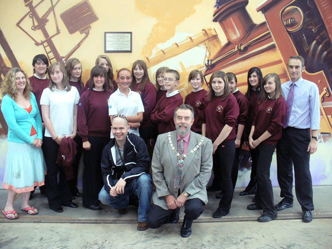 At the front: artist Matt Reeves and Cllr Ken Humphreys. At the ends: Tina Belcher and Dave Whiteley, teachers from Chasetown college with year 9 art students