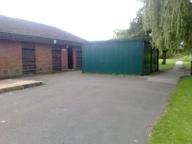 The green container that will be removed and replaced with flower beds and the Swinfen Broun Memorial