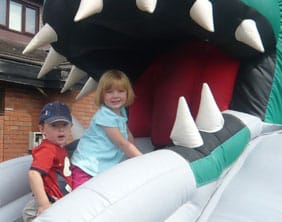 Harvey Hall and Isabel Stanley on the inflatables