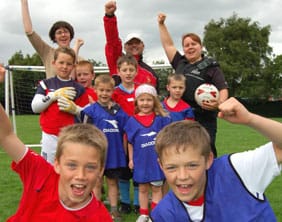 Jack Barlow and Beckham Fulton and other players celebrate the start of the new coaching sessions