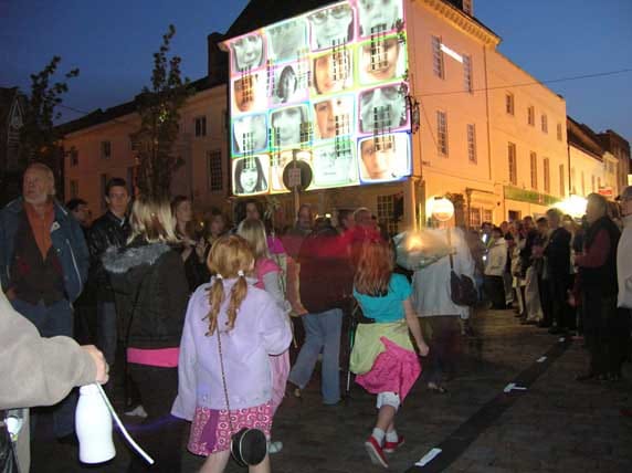 Children lead the lantern parade into the Market Square.