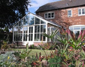 An eco-refurbished farmhouse complete with a triple-glazed conservatory