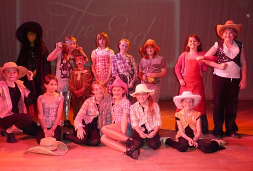 Youngsters performing The Wizard of Oz as part of the musical theatre class