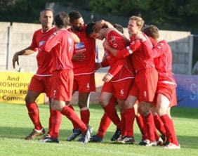 chris-horton-celebration Chasetown's players congratulate Chris Horton on his goal against Lancaster City