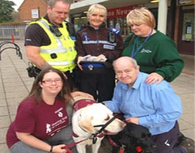 PC Dave Fletcher and PCSO Hilary Gittins with Edward Blacksmith and representatives from Hearing Dogs for Deaf People 