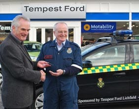 Tempest Ford hand over the keys to the vehicle to the Whittington and Fisherwick Community First Responder Grou