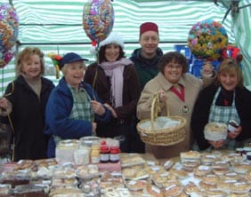 Wi-40th-cropped Cllr Norma Bacon joins traders to celebrate the 40th anniversary in 2004