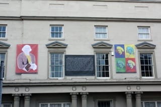 Two of the 52 Weeks of Art posters on St Johns House
