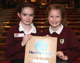 sspeterandpaul SS Peter & St Paul Catholic Primary School students Pippa Peet and Victoria Pickering with the award