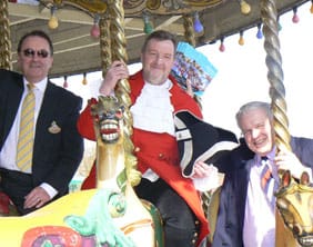 Colin Bryan (Managing Director of Drayton Manor), Ken Knowles (Lichfield Town Cryer), and Cllr David S Smith (Leader of Lichfield District Council)