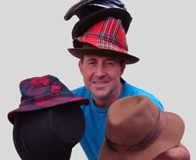 Craig Allen juggling some of the hats he will need for his 25 characters in Ain't no Angels.  Hats courtesy Lichfield Costume Hire.