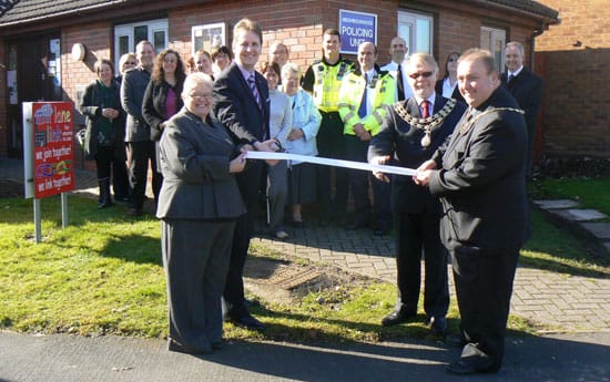 Cllr Joseph Powell cuts the ribbon at Mill Lane Link