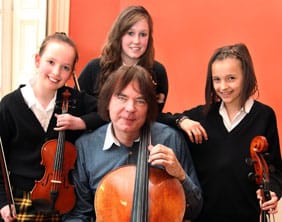Charlotte Howdle, Kathryn McIntosh and Ciara Bryan with Julian Lloyd Webber