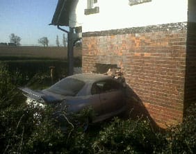 carinhouse The car that crashed through the side of a house on the Tamworth Road in Lichfield.