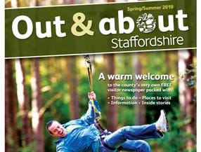 The front cover of the Out and About newspaper