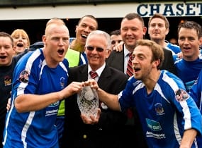 Richard Teesdale and Dave Egan receive the play-off trophy. Pic: John Harris