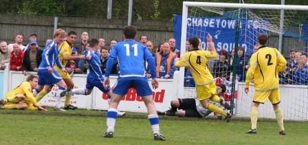 Dean Perrow scores the play-off final winner for Chasetown FC. Pic: Dave Birt