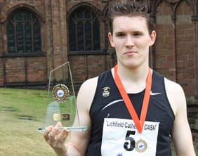 James Whitehouse with the Cathedral Dash trophy